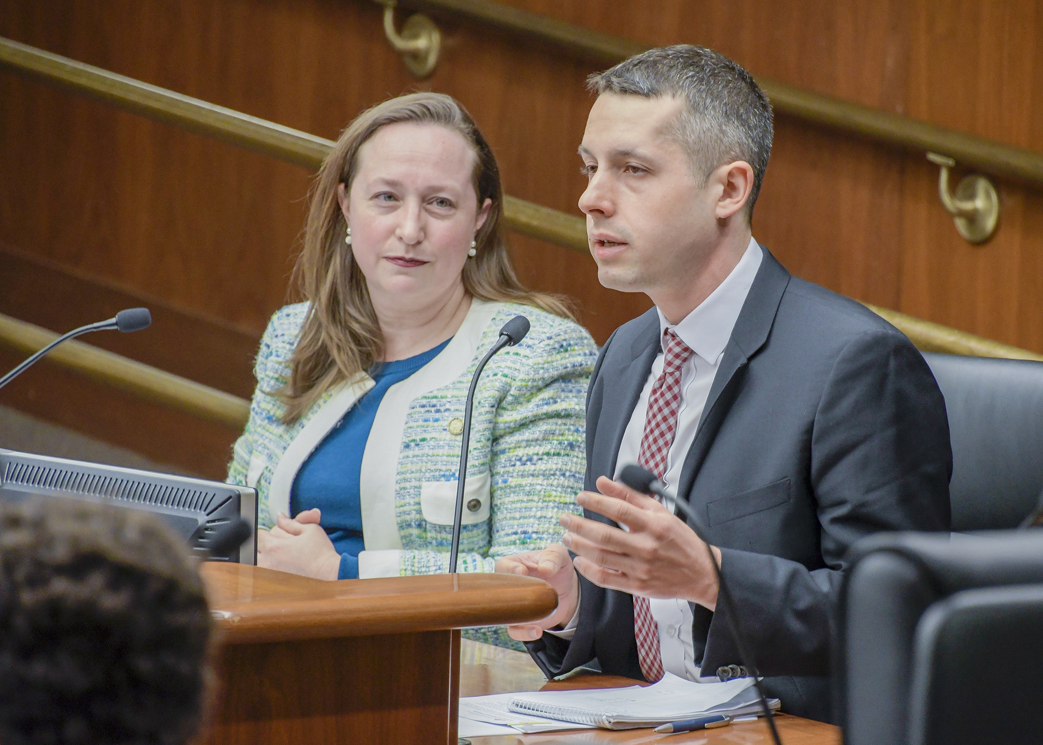 Sam Oliker-Friedland, chief counsel for the Campaign for Secure and Modern Elections, testifies before the House Subcommittee on Elections March 4 in support of a bill sponsored by Rep. Kristin Bahner, left, to establish a system of automatic voter registration. Photo by Andrew VonBank